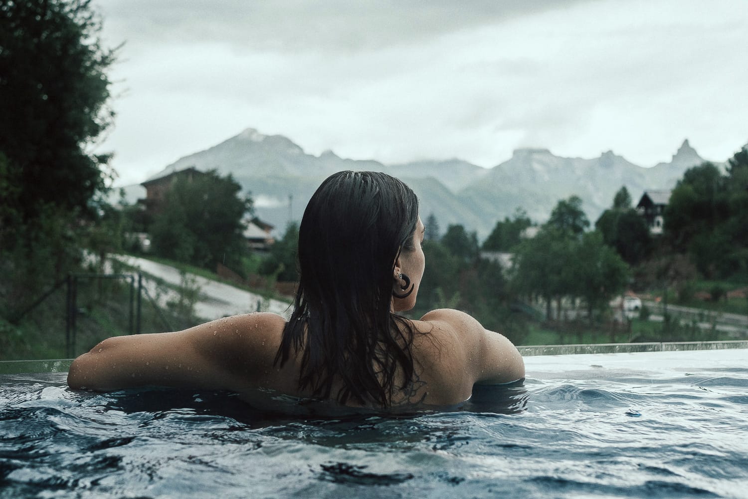 Woman in a pool at Hotel Nendaz 4 Valles