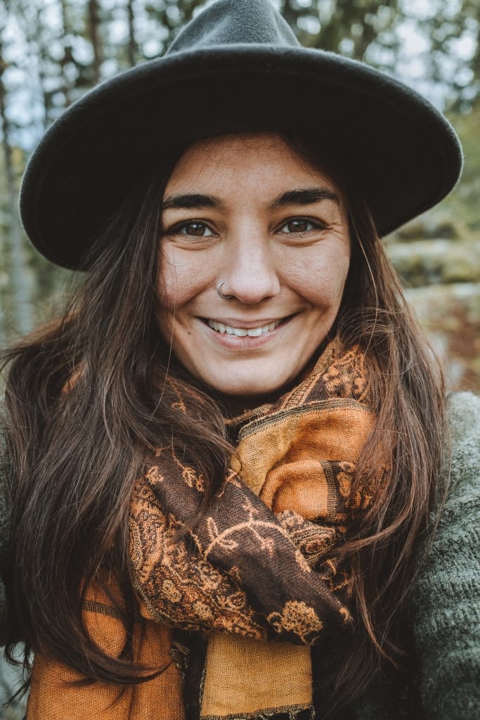 girl in a hat smiling