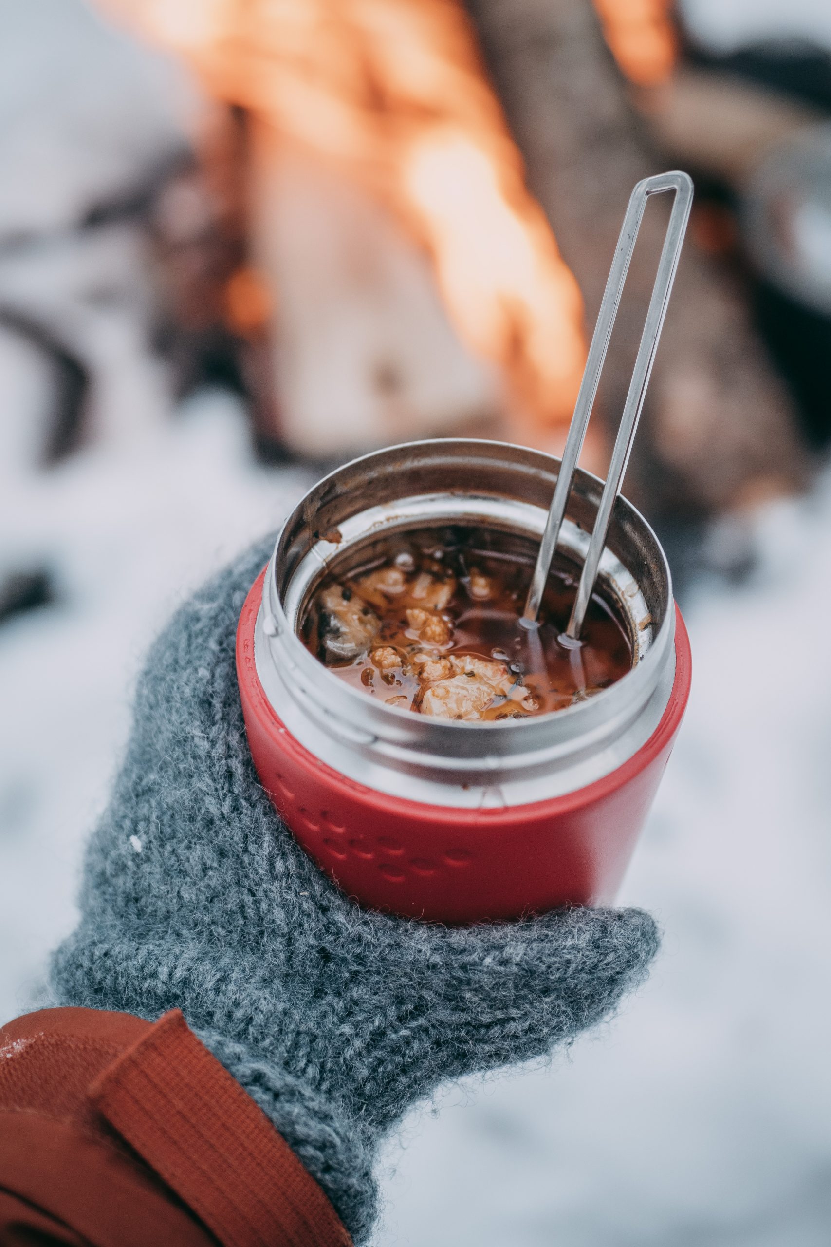 stew by a fire in winter