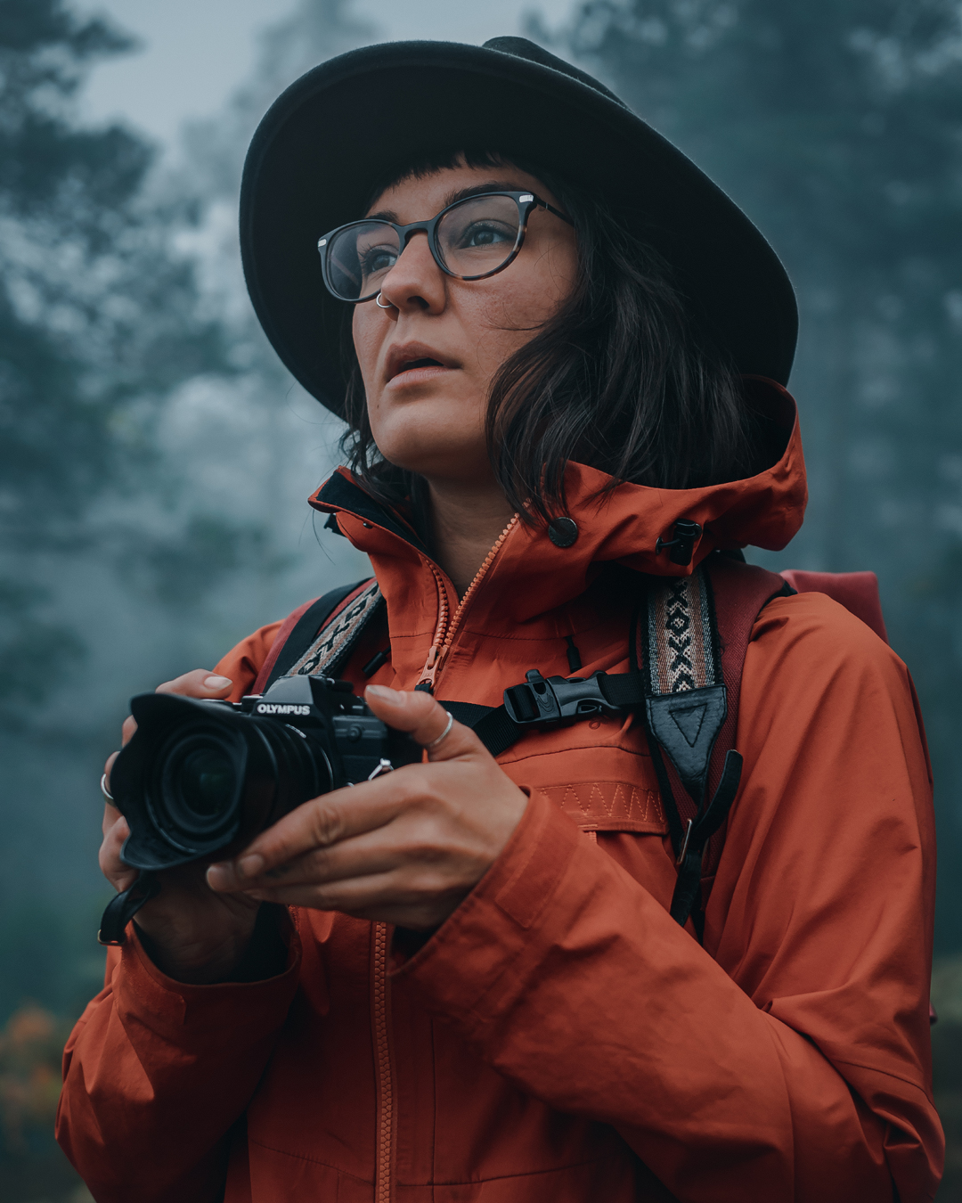 Outdoorsy woman with camera